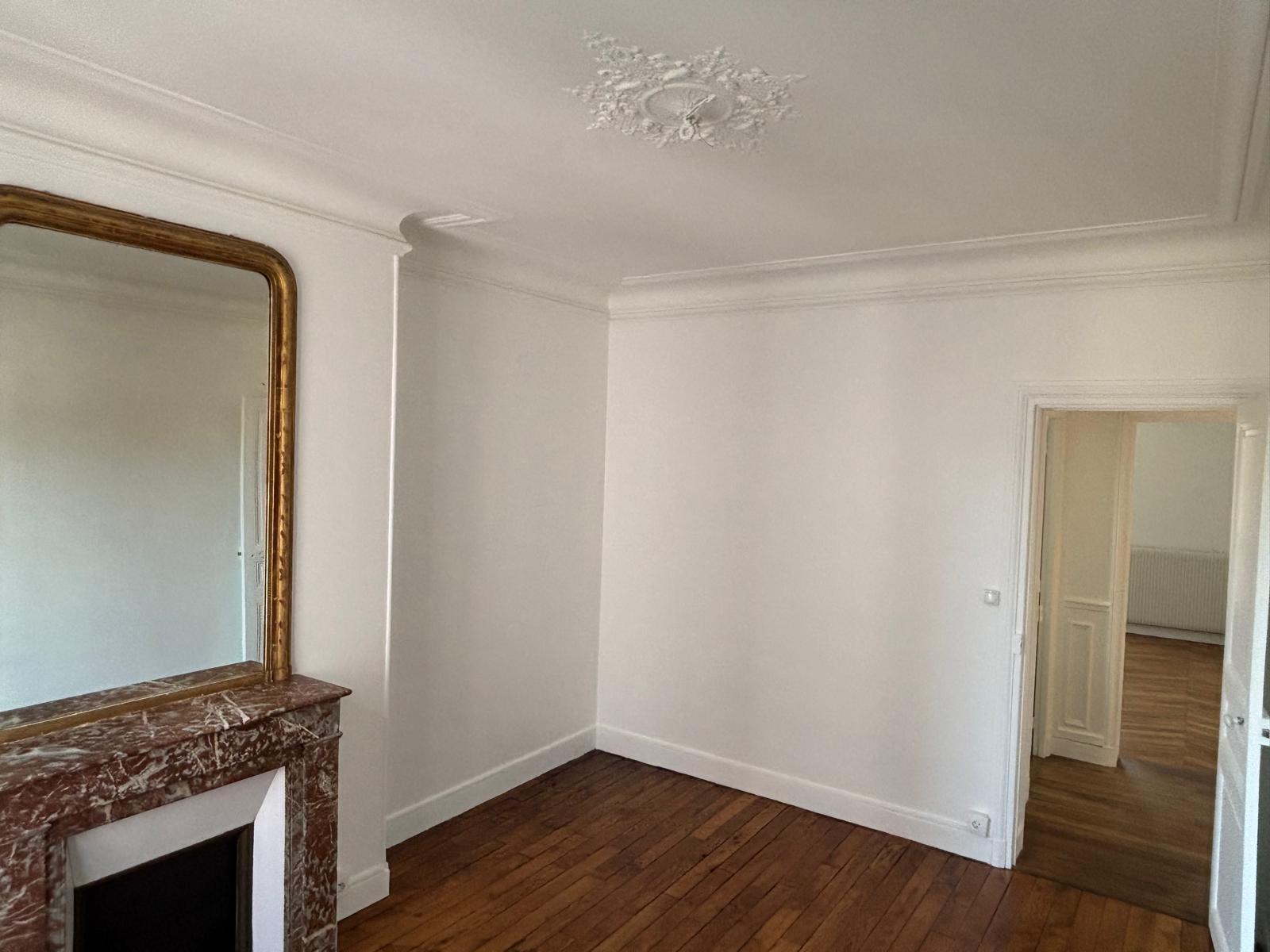 Levallois-Perret — pièce avec cheminée après travaux
